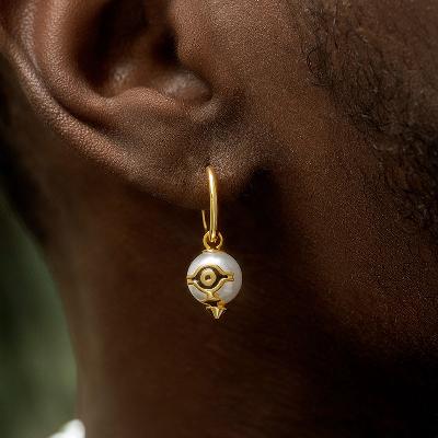 Eye of Amulet Pearl Corn Dangle Earrings