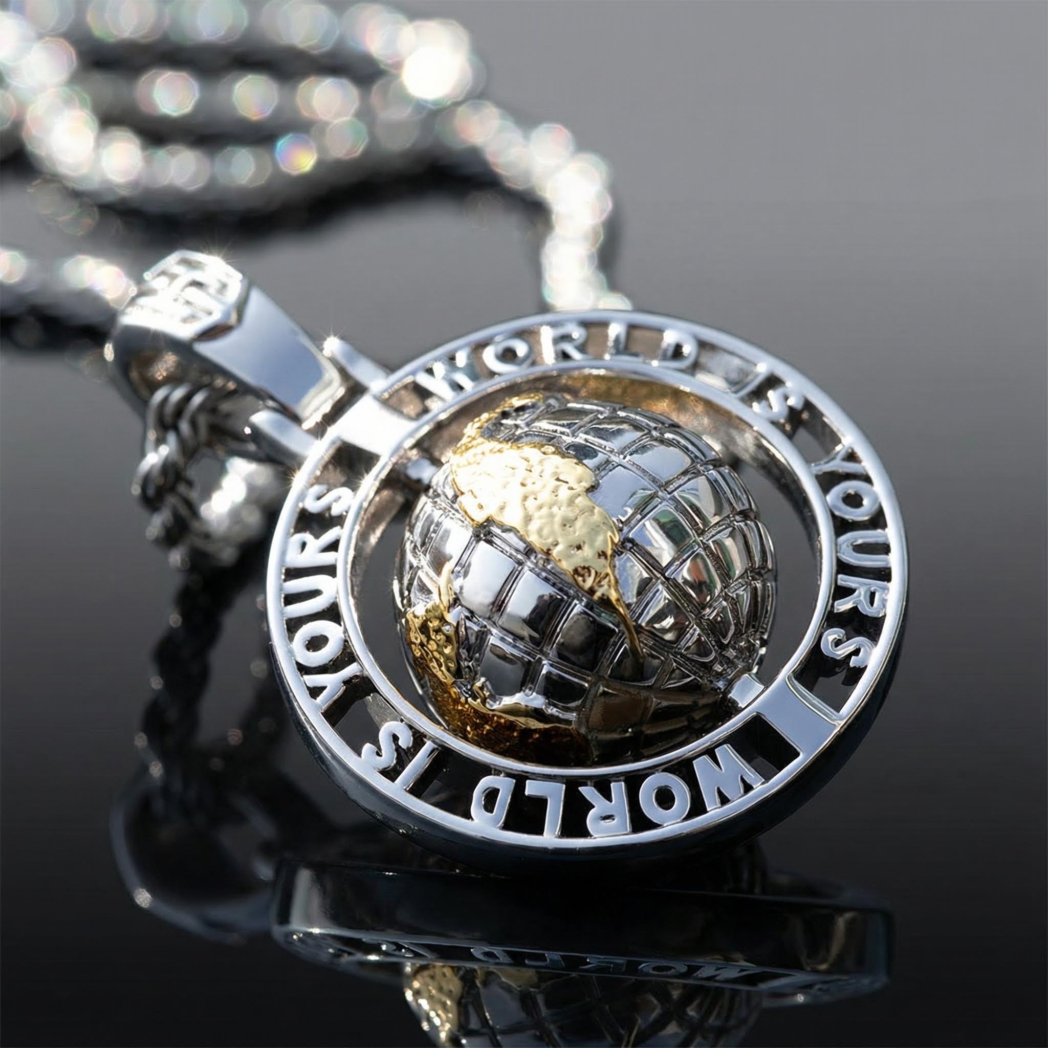 Rotating "World Is Yours" Globe Pendant