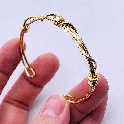 Gold Woven Twisted Open Bracelet
