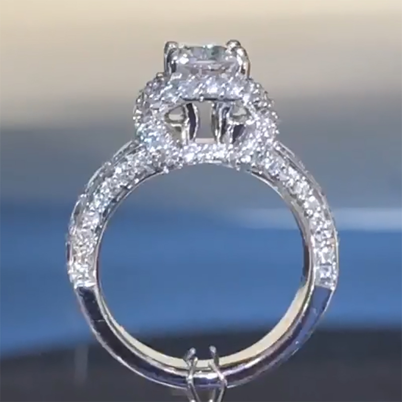Twist Halo Round Cut Engagement Ring