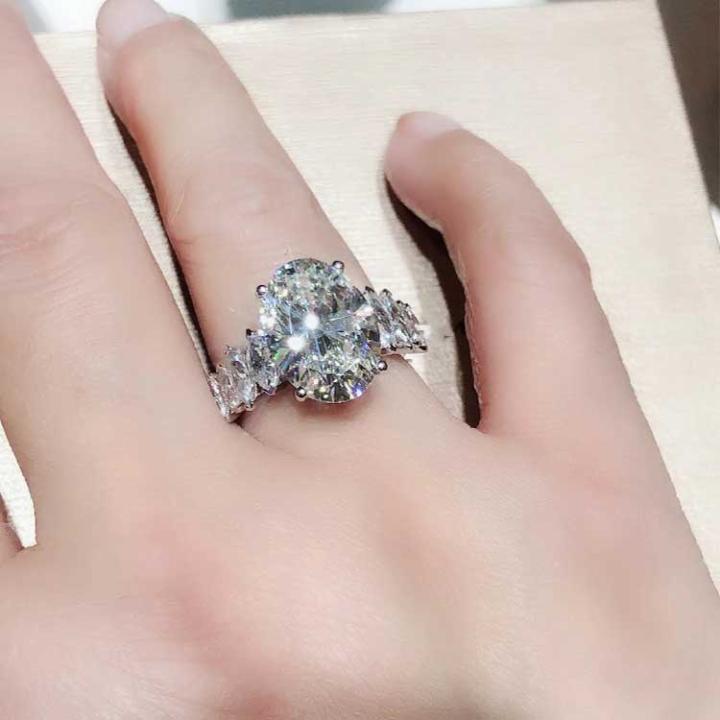 3.5 Ct Brilliant Oval Cut with Marquise Shape Side Stones Ring