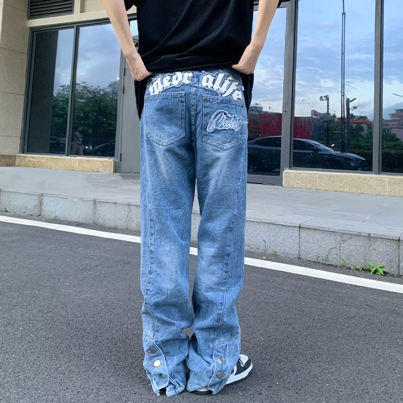 Vintage Letter Embroidered Hem Buttoned Jeans Vintage Letter Embroidered Hem Buttoned Jeans