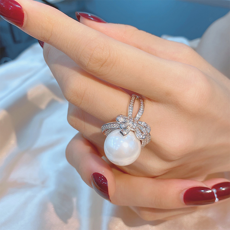 Elegant Pearl & Bow Knot Sterling Silver Engagement Ring