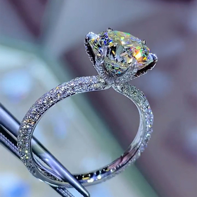 Iced Round Cut 6-Claw Halo Engagement Ring