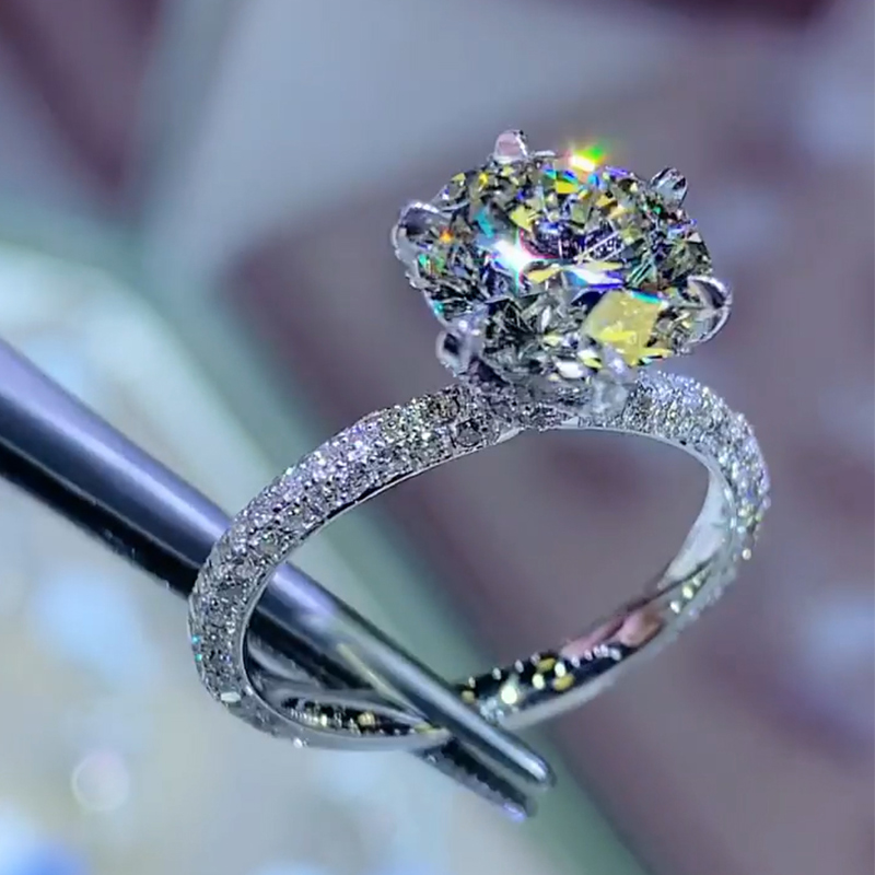 Iced Round Cut 6-Claw Halo Engagement Ring