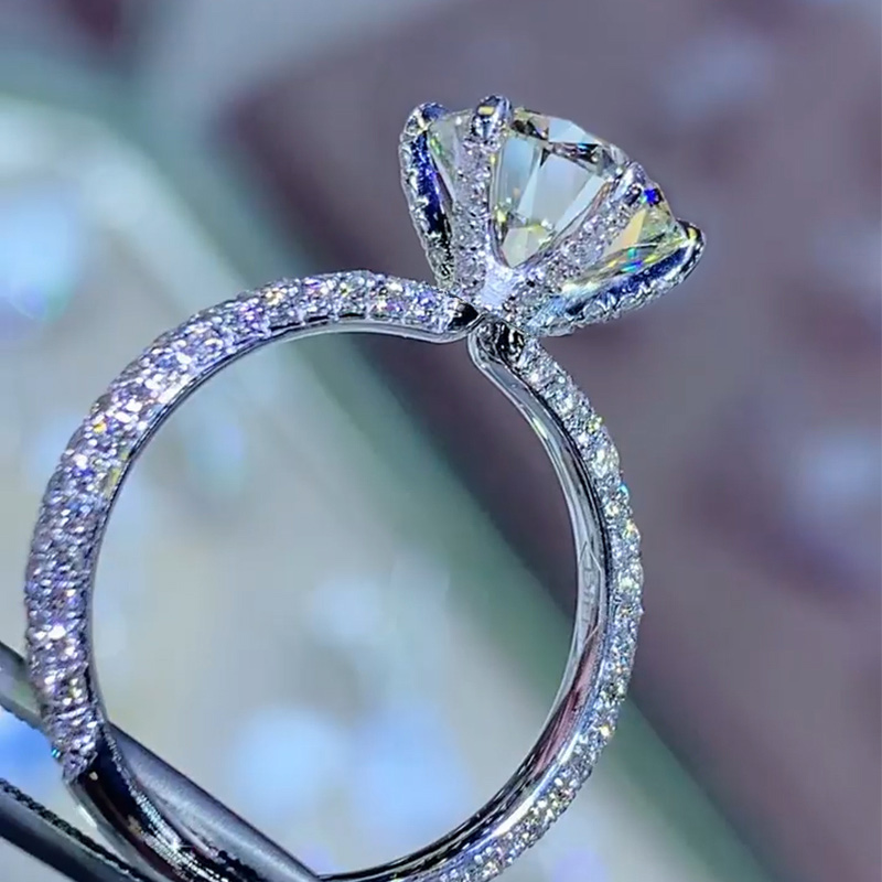 Iced Round Cut 6-Claw Halo Engagement Ring