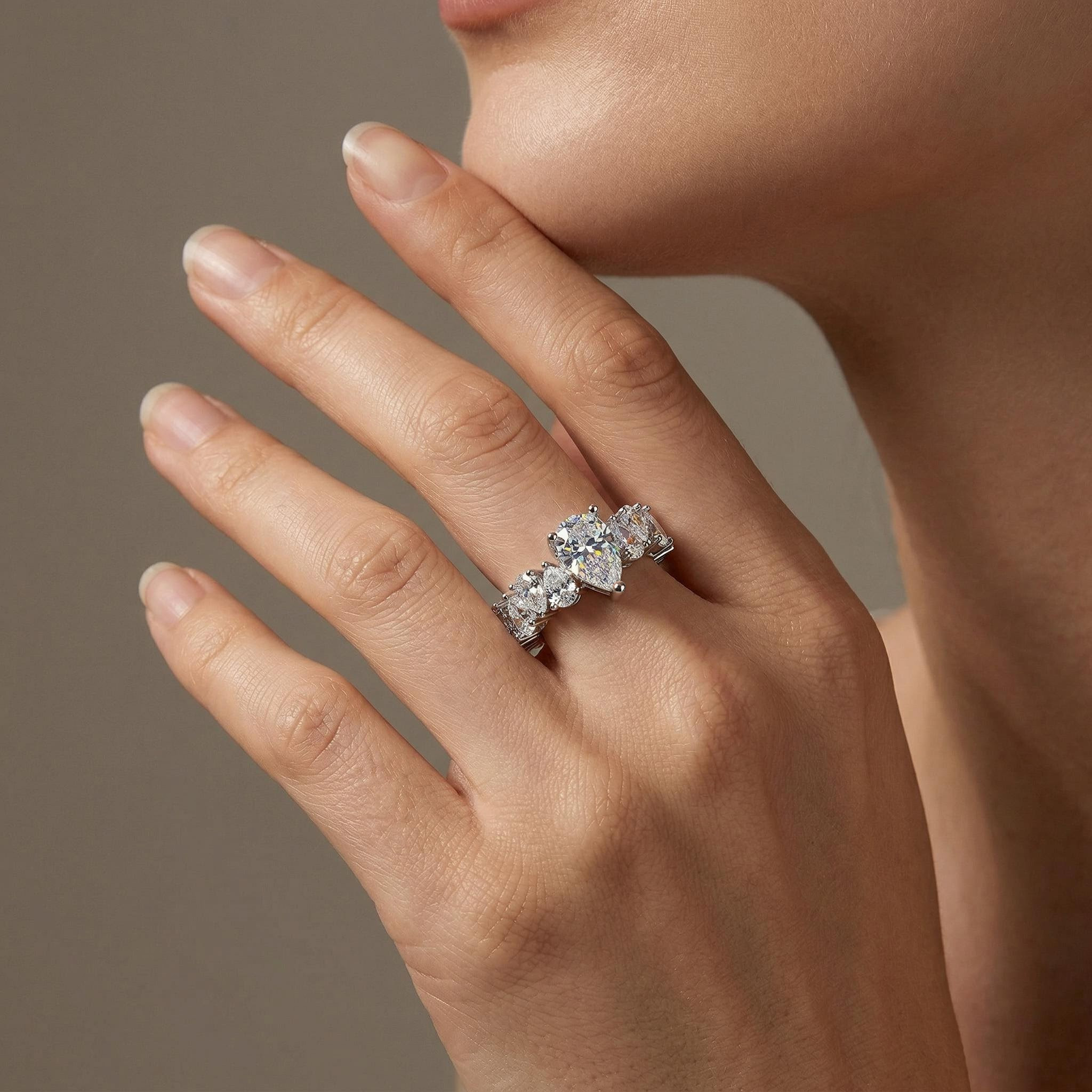 11.6ct. tw. Captivating Pear Cut Eternity Engagement Ring in Sterling Silver