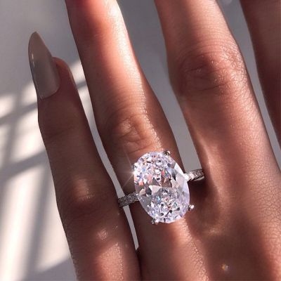  Refined Oval Cut Halo Ring Set