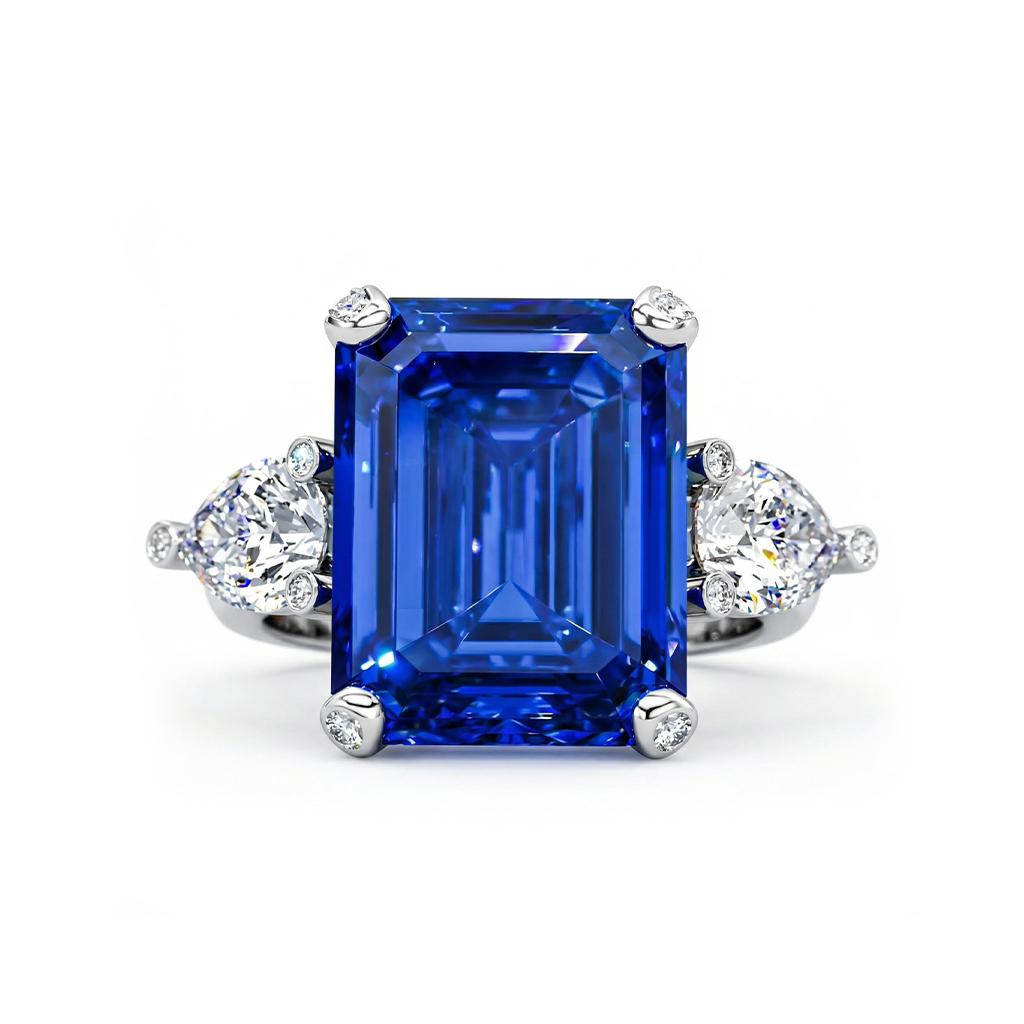 Emerald Cut & Pear Shaped Sapphire & Diamond Three-Stone Ring in Sterling Silver Emerald Cut & Pear Shaped Sapphire & Diamond Three-Stone Ring in Sterling Silver