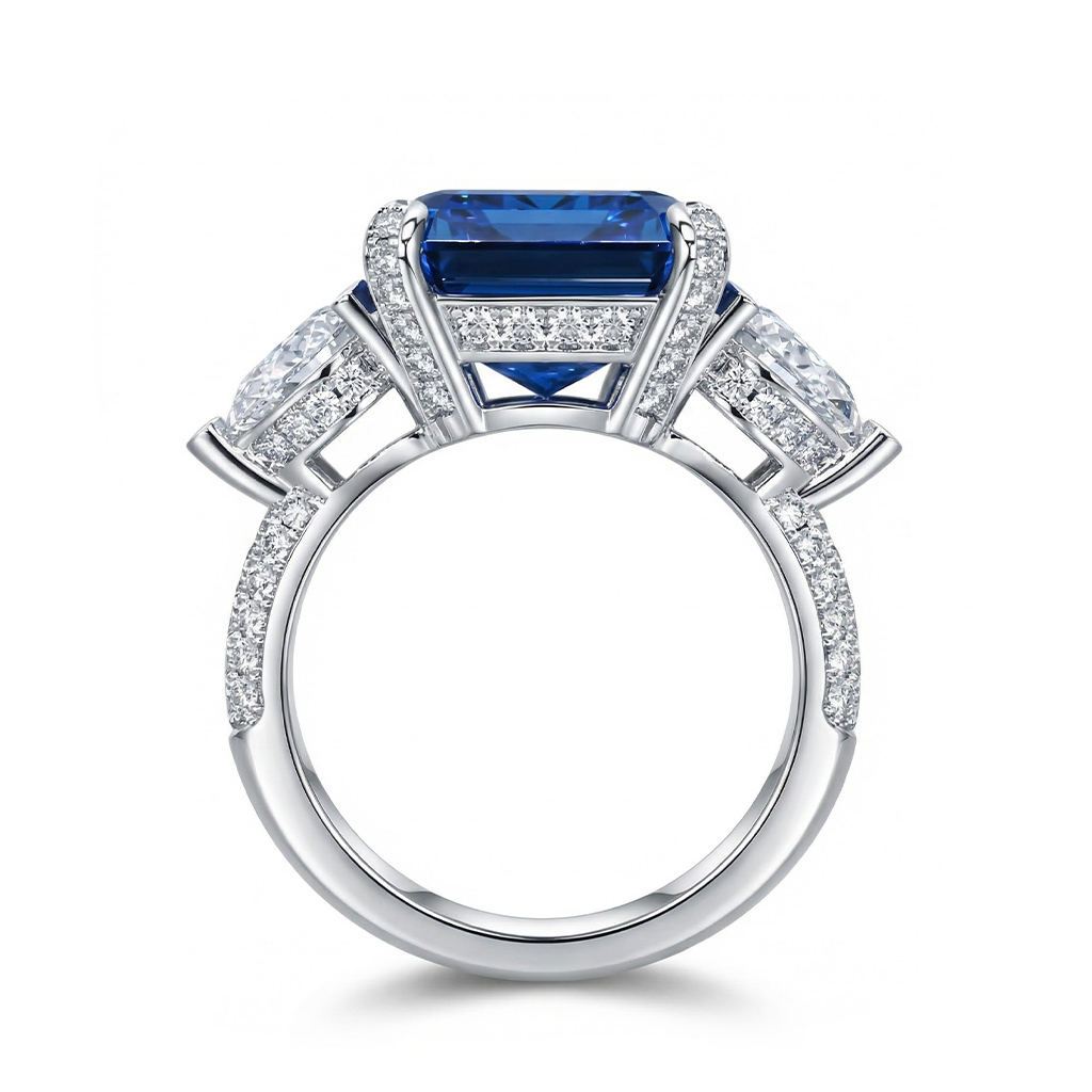 Emerald Cut & Pear Shaped Sapphire & Diamond Three-Stone Ring in Sterling Silver Emerald Cut & Pear Shaped Sapphire & Diamond Three-Stone Ring in Sterling Silver