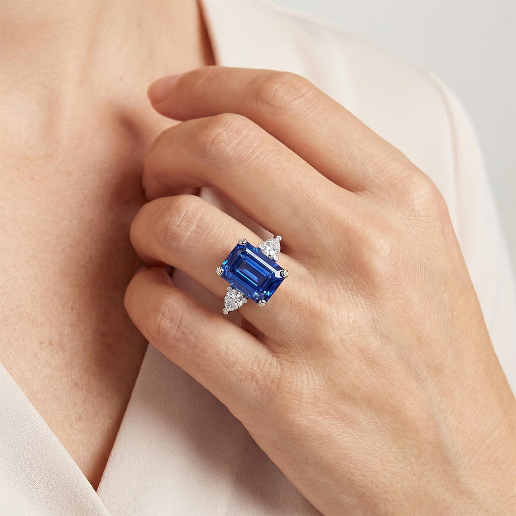 Emerald Cut & Pear Shaped Sapphire & Diamond Three-Stone Ring in Sterling Silver Emerald Cut & Pear Shaped Sapphire & Diamond Three-Stone Ring in Sterling Silver