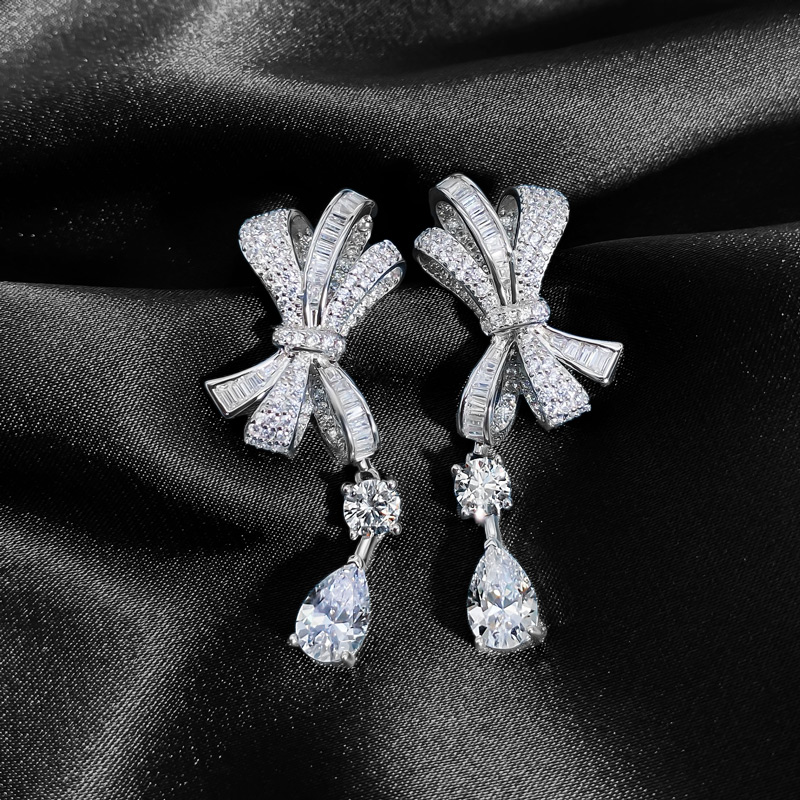 Iced Bowknot & Pear Cut Drop Earring in Sterling Silver Iced Bowknot & Pear Cut Drop Earring in Sterling Silver