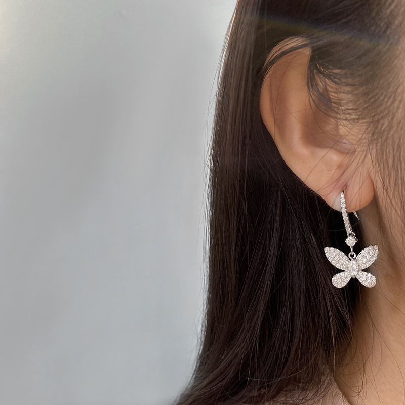 Delicate Butterfly Dangle Earring in Sterling Silver Delicate Butterfly Dangle Earring in Sterling Silver