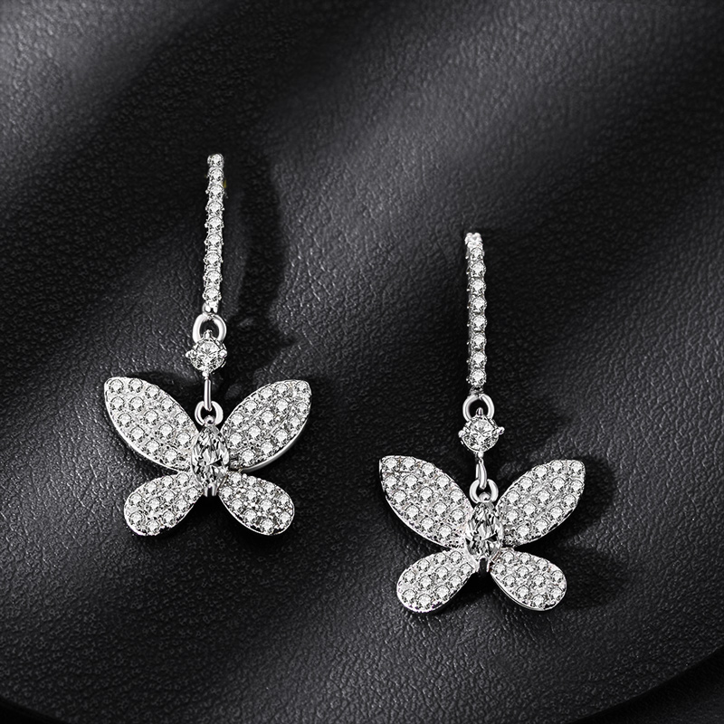 Delicate Butterfly Dangle Earring in Sterling Silver Delicate Butterfly Dangle Earring in Sterling Silver