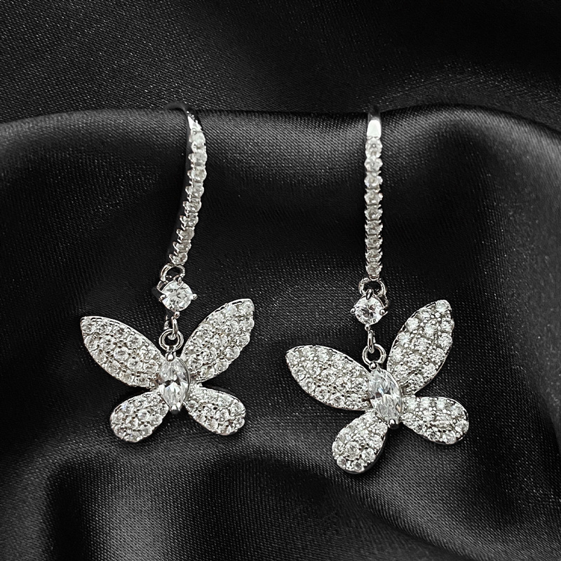 Delicate Butterfly Dangle Earring in Sterling Silver Delicate Butterfly Dangle Earring in Sterling Silver