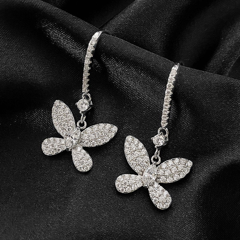 Delicate Butterfly Dangle Earring in Sterling Silver Delicate Butterfly Dangle Earring in Sterling Silver