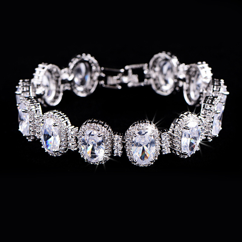 18mm Iced Out Oval Cut Multi-color Bracelet in White Gold