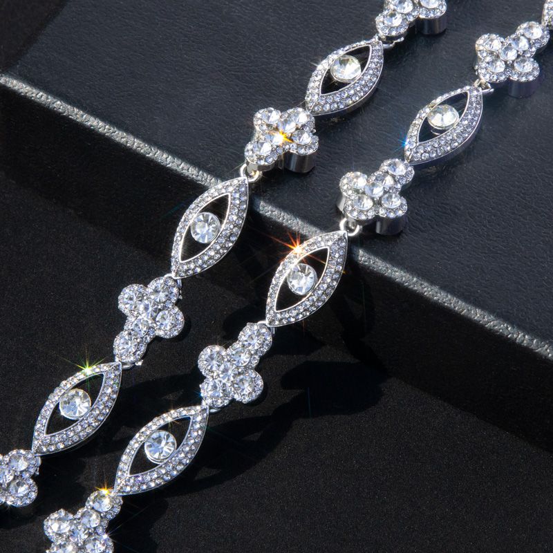 Round Diamonds Cross with Evil Eyes Chain in White Gold