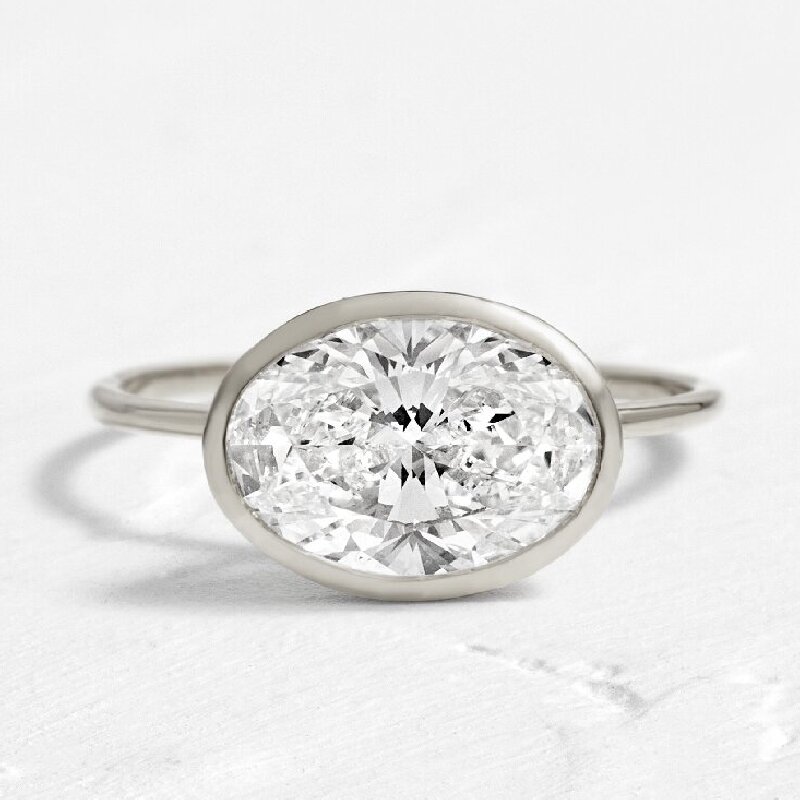 Simple Oval Cut Solitaire Engagement Ring