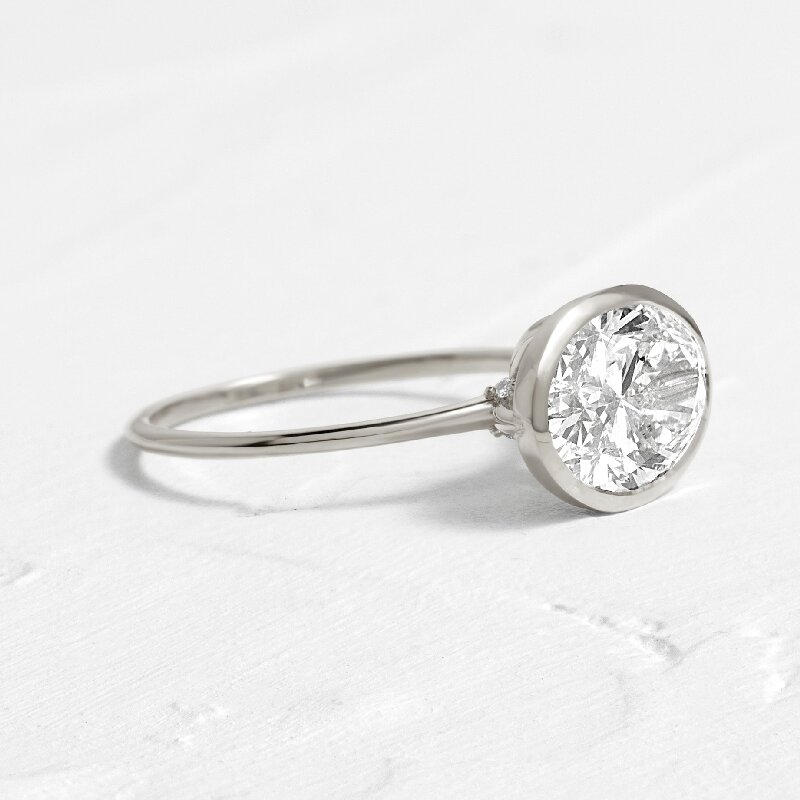 Simple Oval Cut Solitaire Engagement Ring