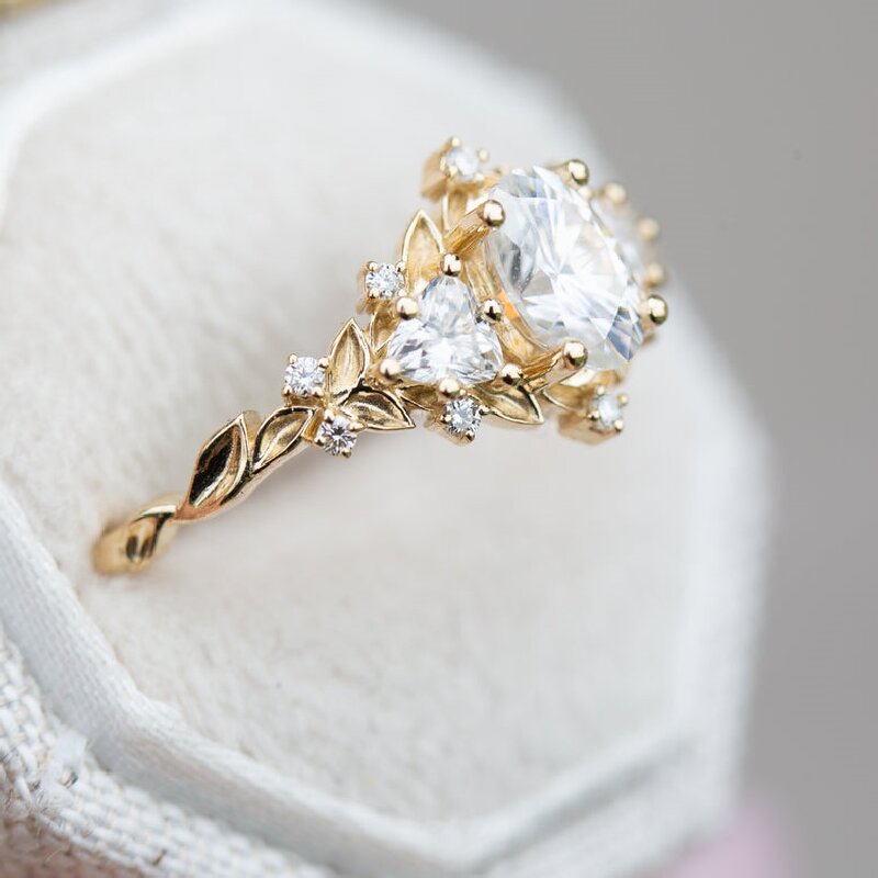 Three Stones with Oval and Triangle Cut Engagement Ring in Gold