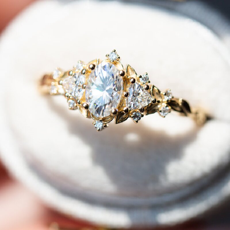 Three Stones with Oval and Triangle Cut Engagement Ring in Gold