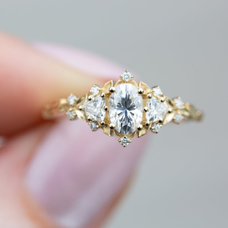 Three Stones with Oval and Triangle Cut Engagement Ring in Gold