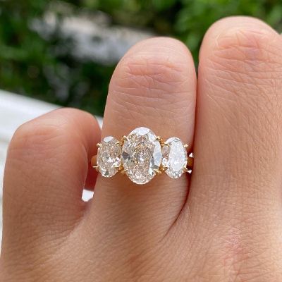 Three-stone Oval Cut Engagement Ring in Gold