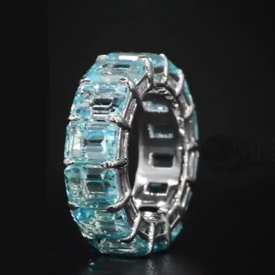 Blue Topaz Emerald Cut Eternity Band