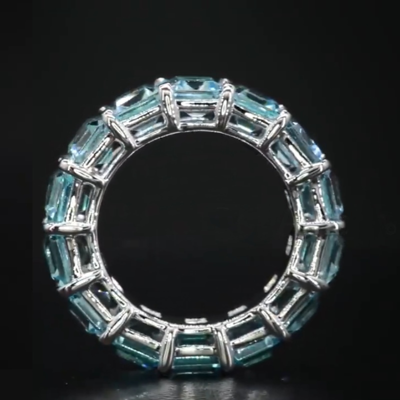 Blue Topaz Emerald Cut Eternity Band