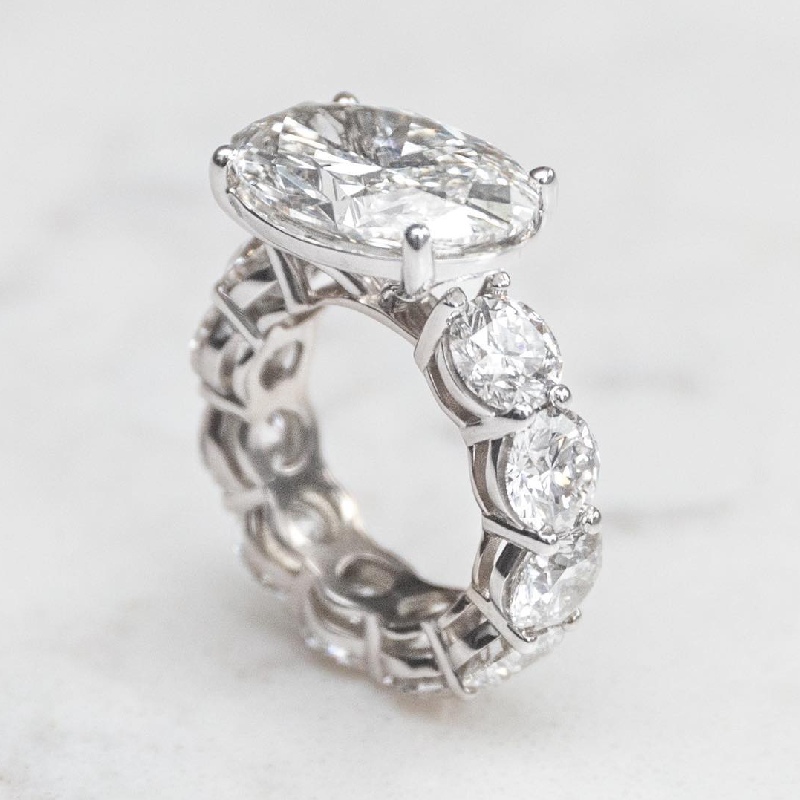 8.5ct Oval Cut with Pave Round Cut Engagement Ring