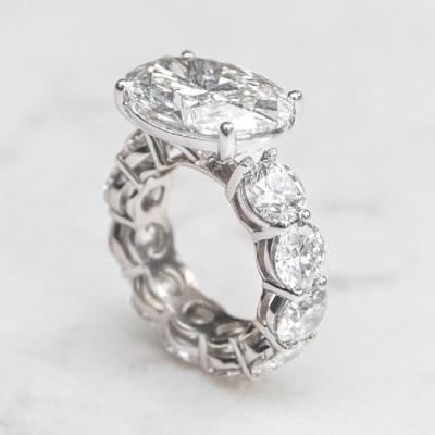 8.5ct Oval Cut with Pave Round Cut Engagement Ring