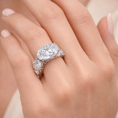 8.5ct Oval Cut with Pave Round Cut Engagement Ring