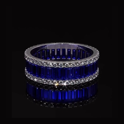 Stunning Emerald Cut Sapphire Halo Band