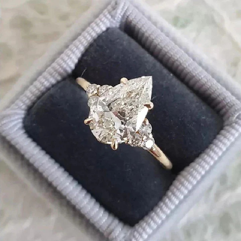 Pear Cut with Side Round Diamond Engagement Ring