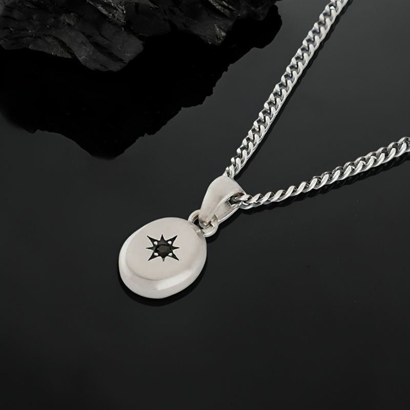 0.1 CTW Black Diamond North Star Pendant