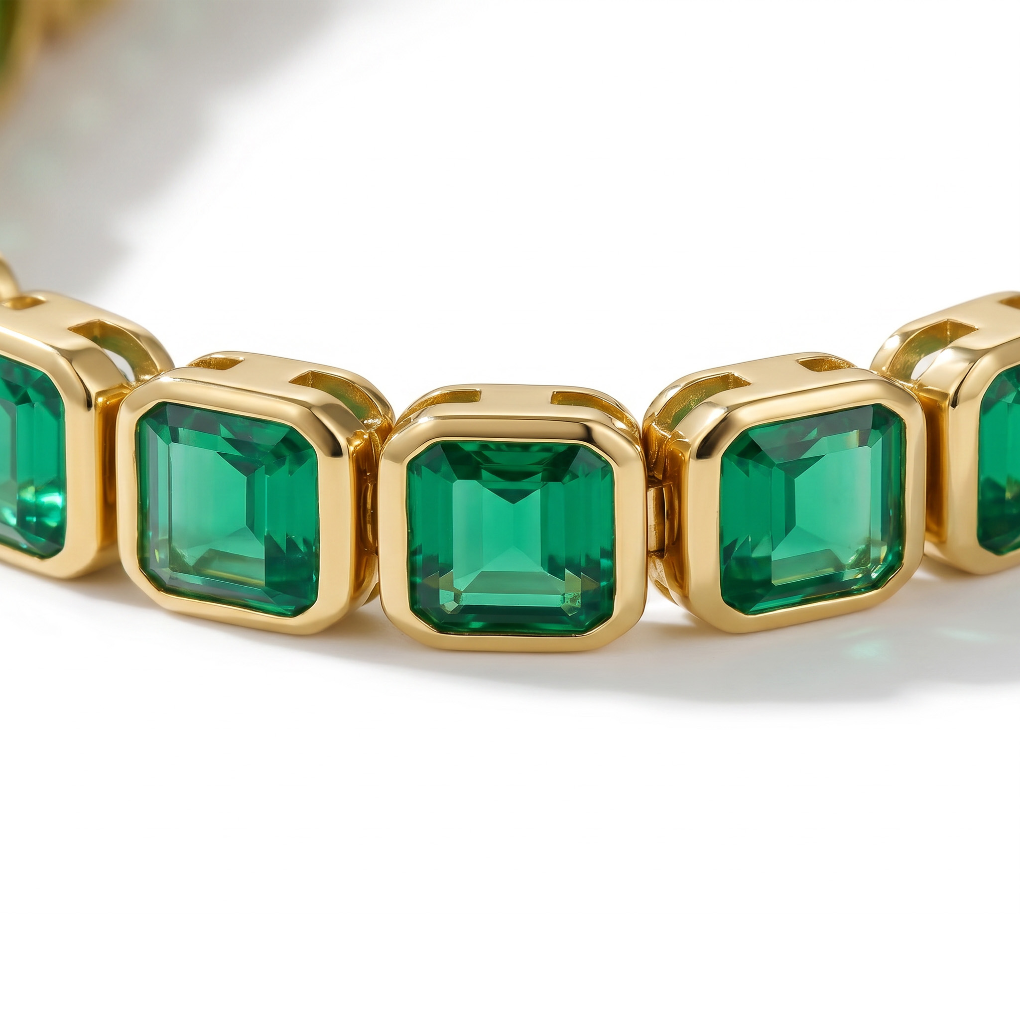 S925 Silver Emerald Tennis Bracelet in Yellow Gold