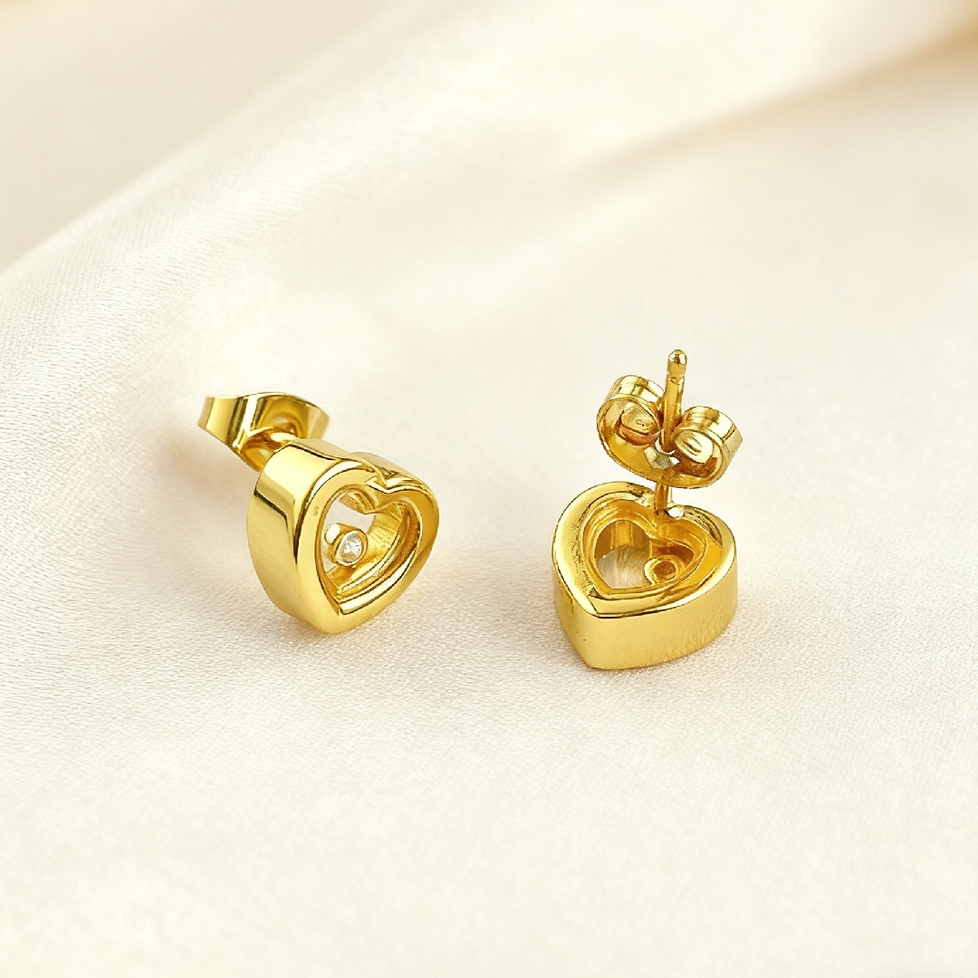 S925 Silver Heart Shape Dancing Diamonds Stud Earrings