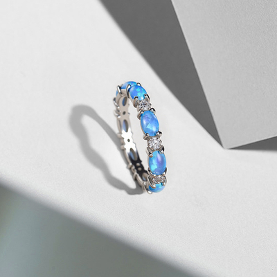 Oval Cut Blue Opal Eternity Band with White Plated