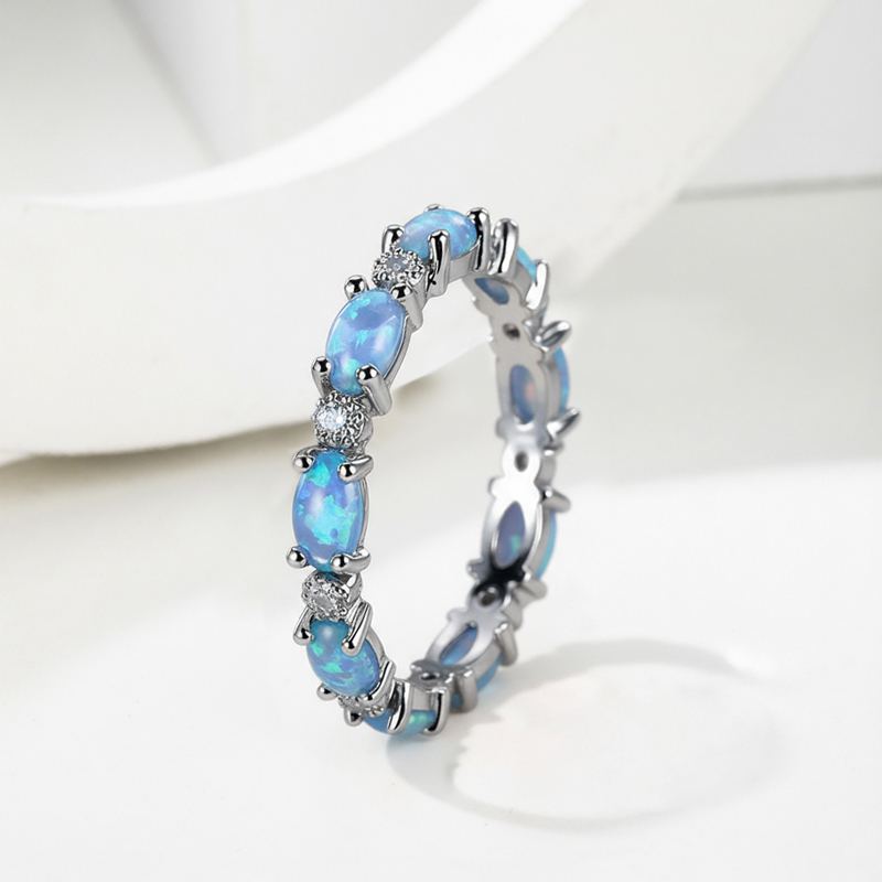 Oval Cut Blue Opal Eternity Band with White Plated Oval Cut Blue Opal Eternity Band with White Plated