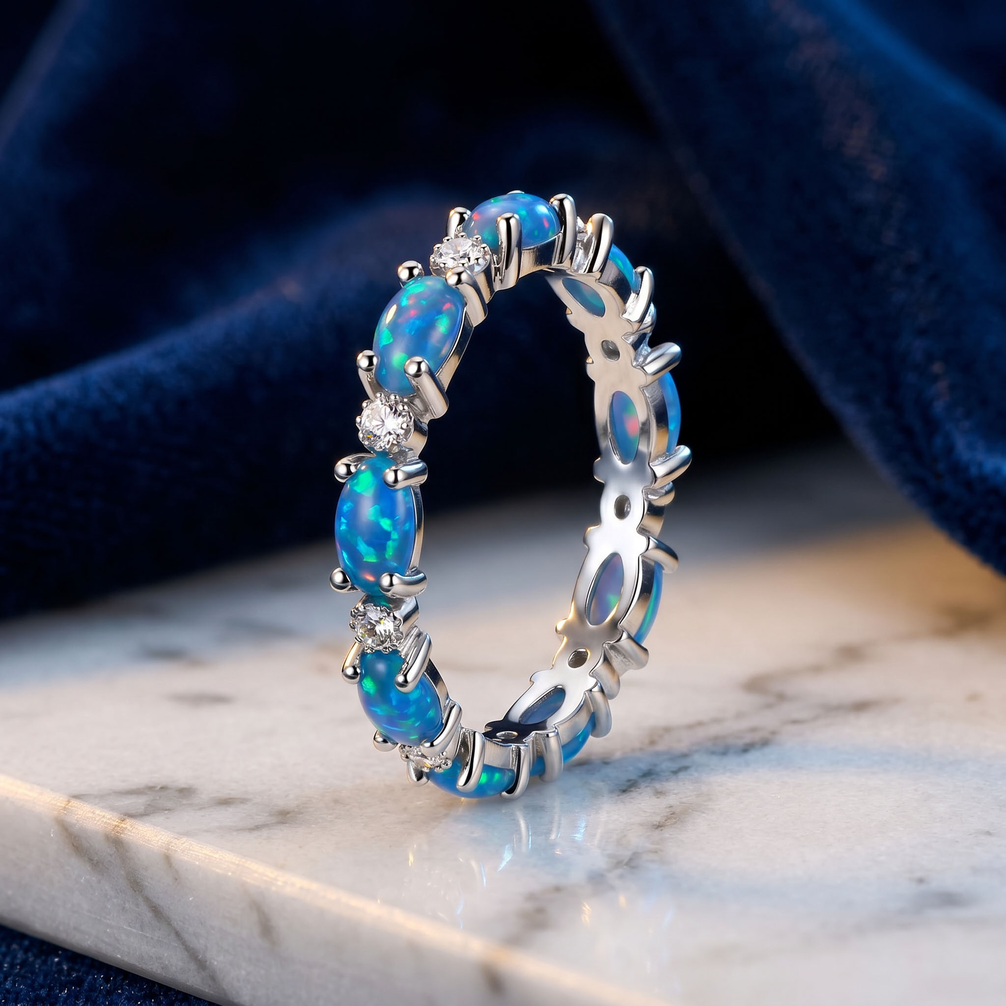 Oval Cut Blue Opal Eternity Band with White Plated