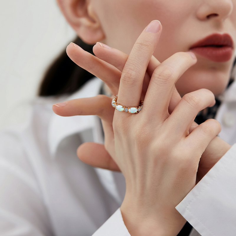 Oval Cut White Opal Eternity Band with Gold Plated Oval Cut White Opal Eternity Band with Gold Plated