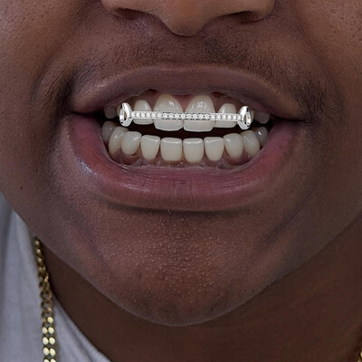 Iced Out One-Line Vampire Fang Grillz