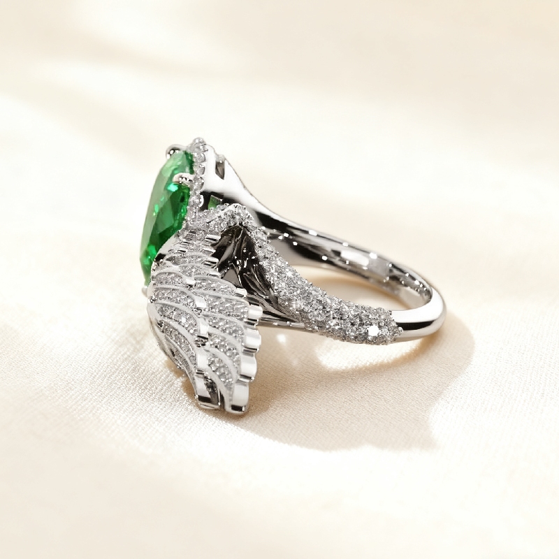 Pear Cut Emerald Gemstone Pave Engagement Ring with Wings