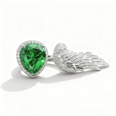 Pear Cut Emerald Gemstone Pave Engagement Ring with Wings