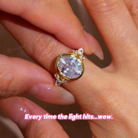 5.4ct. tw. Oval Cut VVS Moissanite Side Stone Engagement Ring