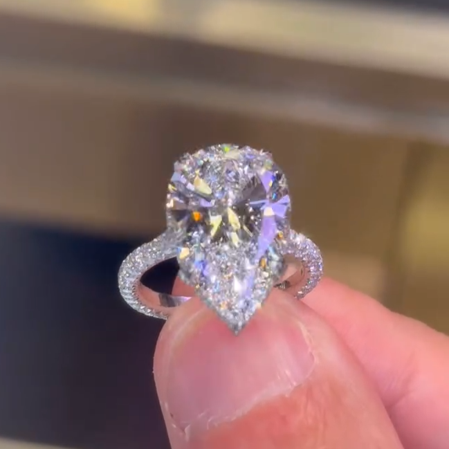 7.68CT Pear Cut VVS Moissanite Pave Engagement Ring 7.68CT Pear Cut VVS Moissanite Pave Engagement Ring