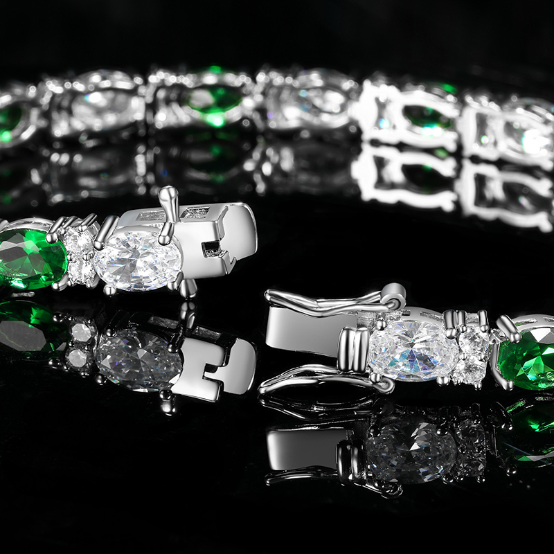 Iced Out White&Emerald Oval Stone Bracelet in White Gold