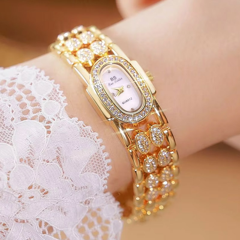 Iced Oval Dial Women's Quartz Bracelet Watch