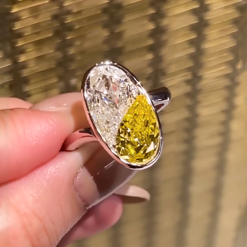 White & Yellow Pear Cut Oval Shape Bezel Engagement Ring